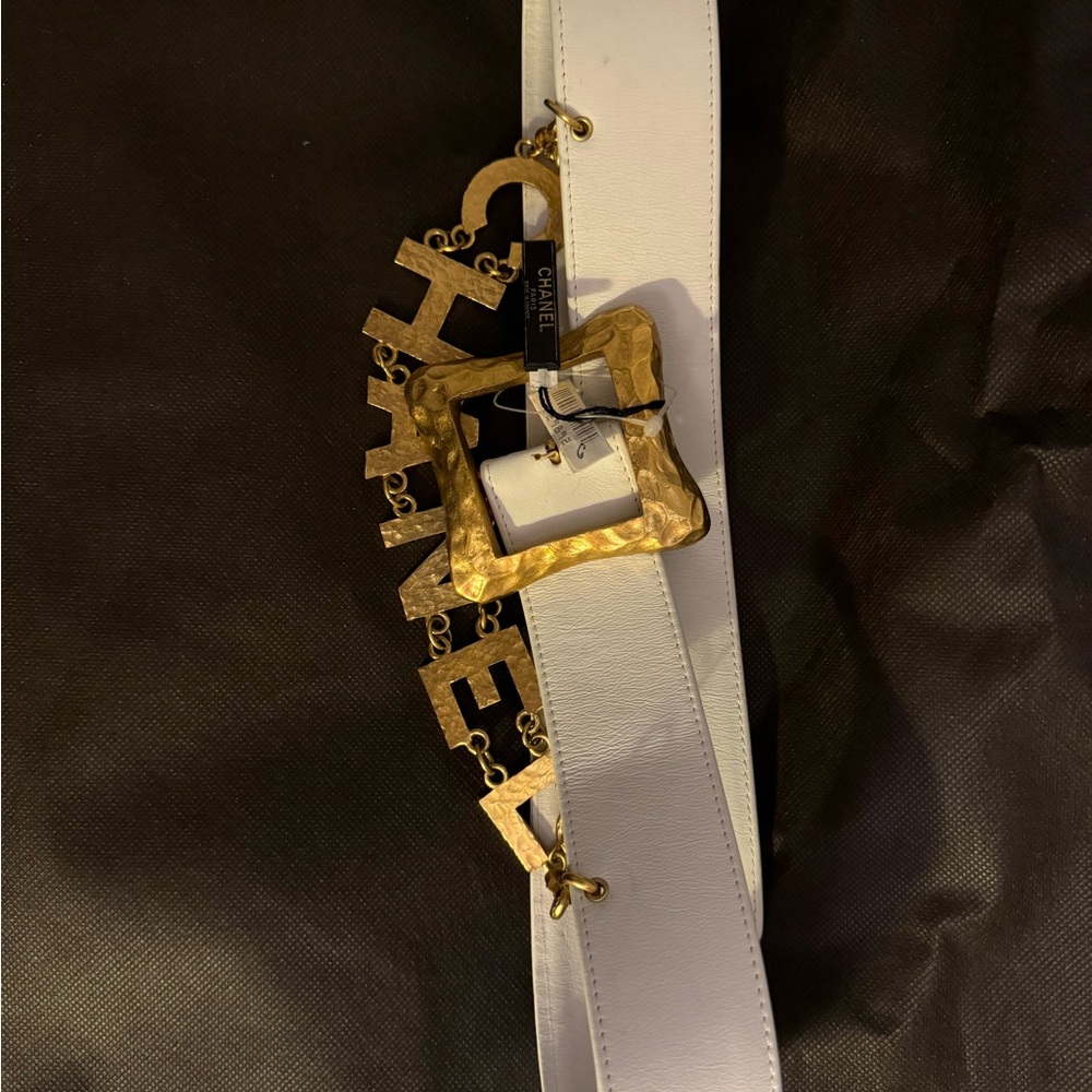 Vintage AUTHENTIC CHANEL belt in white calf leather with logo drape chain.